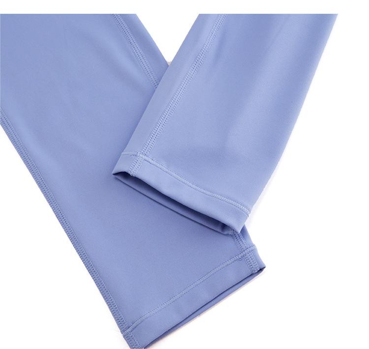 Folded light blue fabric on a white background